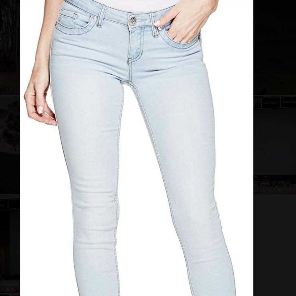 Guess light blue low rise skinny jeans